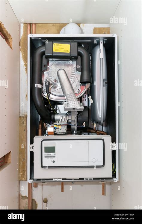 The installation of a Vaillant ecoTEC pro 28 combination boiler into Stock Photo, Royalty Free ...