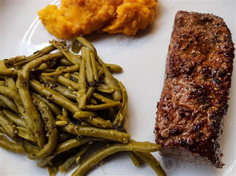 Rosemary lamb steaks with garlic 3008090 Stock Photo at Vecteezy