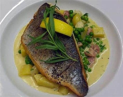 Pan fried Sea Bream fillet with creamed petit pois..