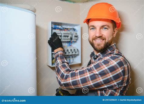 Handsome Young Man Electrician Working on Switchboard of House Building Construction Site Stock ...