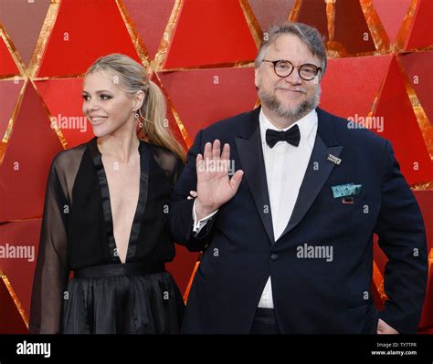 Screenwriter Kim Morgan and film director Guillermo del Toro arrive on the red carpet for the ...