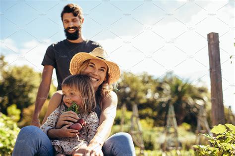 Farmer family enjoying themselves | People Images ~ Creative Market