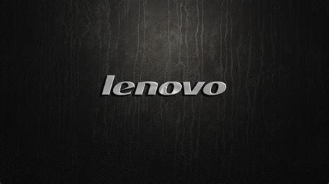 the lenovo logo is shown on a black leather surface with white ...