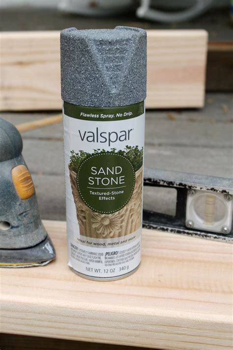 This is awesome spray paint by Valspar. It looks like real Sand Stone. Here it was used to ...