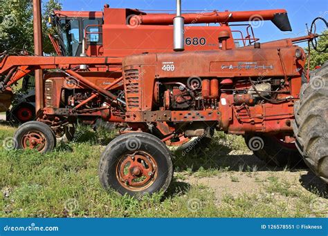 Old Rusty Tractor Used for Salvage and Parts in a Junkyard Editorial ...