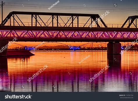 Colorful Light Rail Bridge With An Old Train Bridge Behind It Across ...