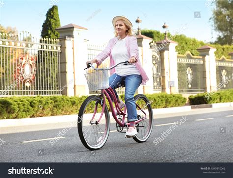 196,873 Riding Bike Women Images, Stock Photos & Vectors | Shutterstock