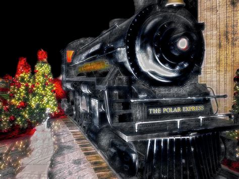 Trains The Polar Express Arriving In Union Station Photograph by Thomas Woolworth