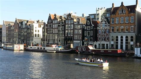 Walking along Amstel river in Amsterdam - YouTube