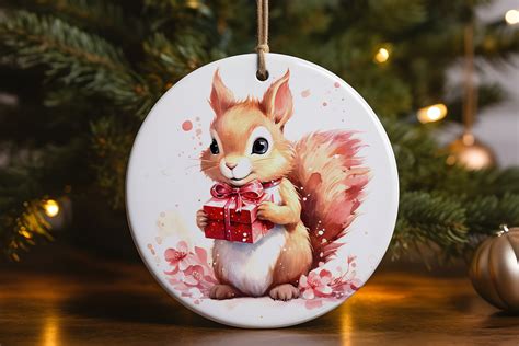 The Squirrel Holding Ornament Graphic by R.Ray Design · Creative Fabrica