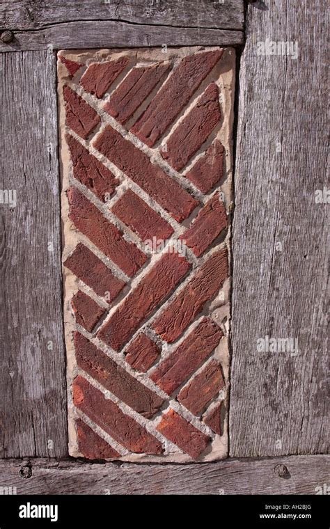 Herringbone bond brickwork used as infill in traditional timber framed ...