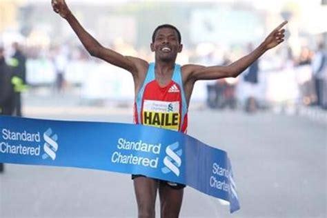 Gebrselassie fights off back pain and late race challenge to collect ...