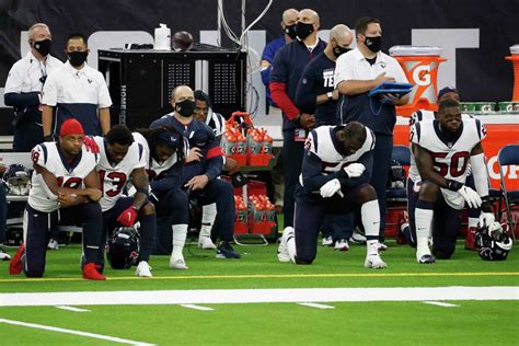 Texans coach Bill O'Brien takes knee with players during anthem