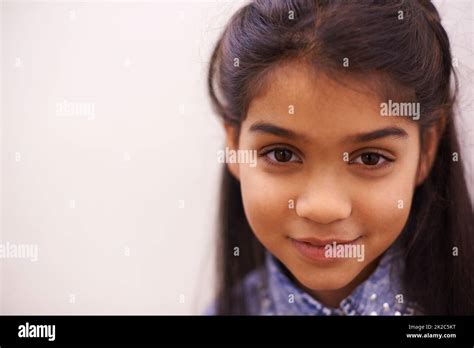 Shes a cutie. Portrait of a cute little girl smiling Stock Photo - Alamy