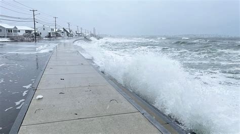 Winter storm flooding at high tide at Long Sands Beach in York, Maine