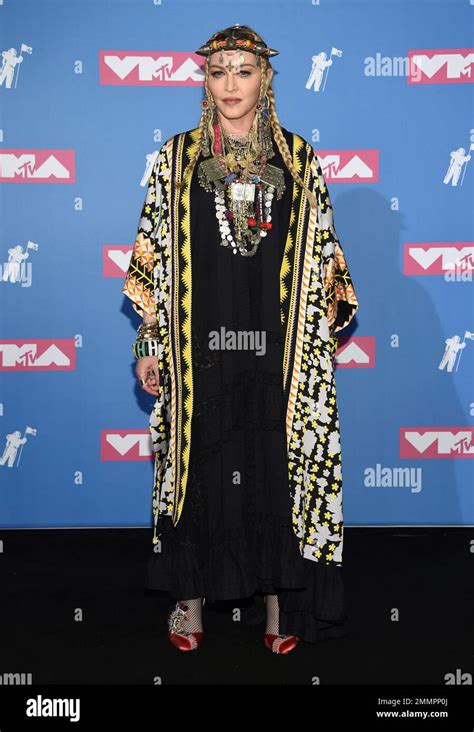 Madonna poses in the press room at the MTV Video Music Awards at Radio City Music Hall on Monday ...