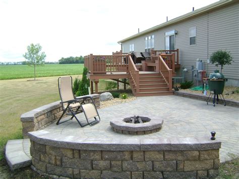 Custom patio with fire pit below raised deck | Outdoor fire pit, Patio, Fire pit