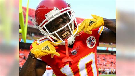 Tyreek Hill Is Showing Golden Teeth Wearing Red Sports Dress And Helmet ...