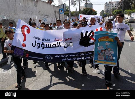 June 22, 2011 - Gaza City, Gaza Strip - Palestinian children hold up ...