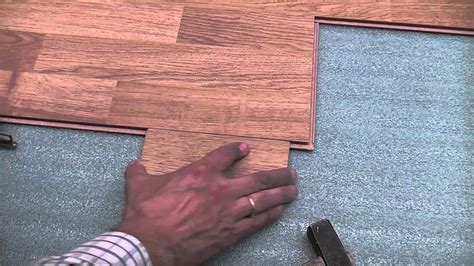Laminate flooring installation trick - YouTube