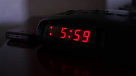 digital alarm clock turns six o'clock Stock Footage Video (100% Royalty ...