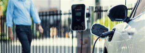 Focus Closeup EV Car Recharge Battery at Public Charging Station. Stock Photo - Image of ...