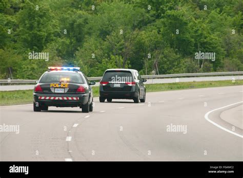 Police car chase hi-res stock photography and images - Alamy