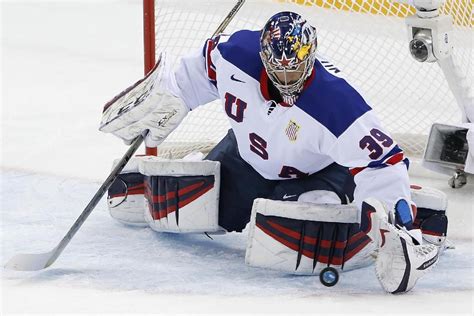 USA Goaltender Ryan Miller stops a shot on the goal during the 2014 ...