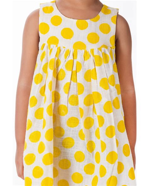 Yellow polka dot printed dress by Chheent | The Secret Label