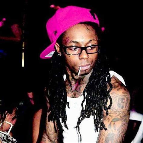 15 Rappers Who Wear Glasses