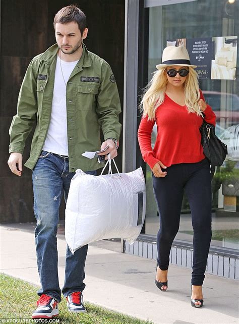 Christina Aguilera shows off her slimmed down figure as she goes ...