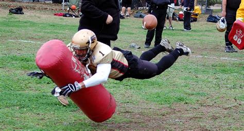 Women Who Play Football: Getting Low; Tackling Dummies; Learning from the guys