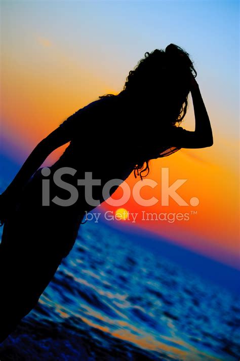 Woman Silhouette At Sunset On The Beach Stock Photo | Royalty-Free | FreeImages