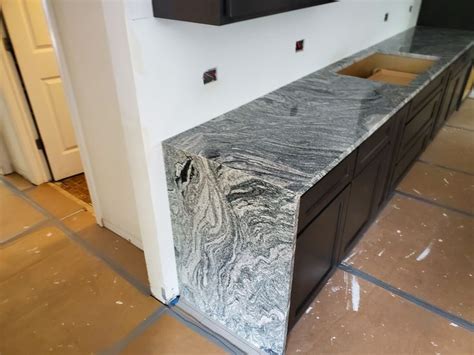 waterfall edge | Granite countertops, Countertops, Waterfall edge