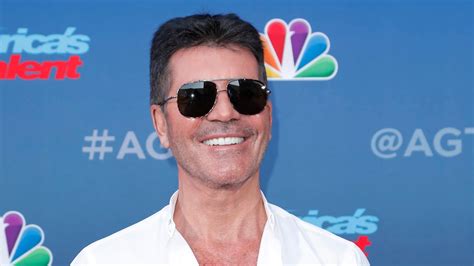 Simon Cowell photographed for first time since breaking his back