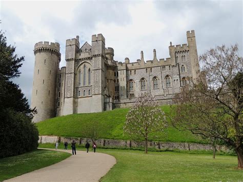 Arundel Castle perched high on a hill overlooking the South Downs and ...