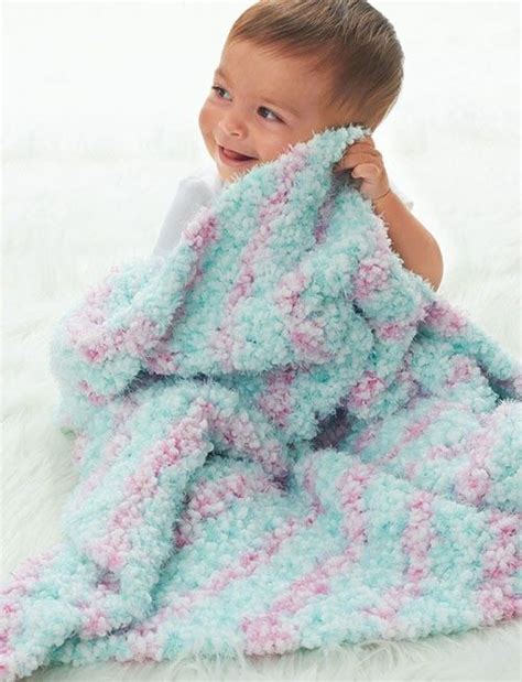 Soft and fuzzy blanket in modern baby shades. | Baby blanket crochet pattern, Crochet baby