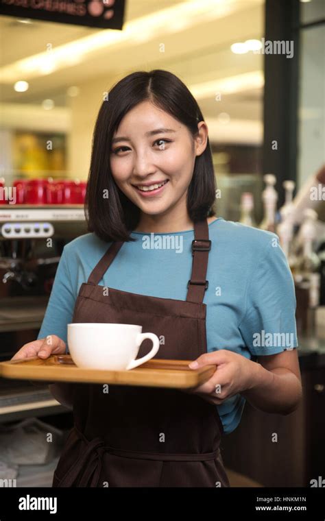 Coffee shop attendant Stock Photo - Alamy