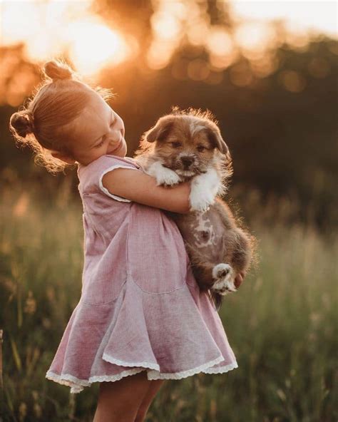 Adorable Children With Baby Animal Photos Showcase Sweet Bonds