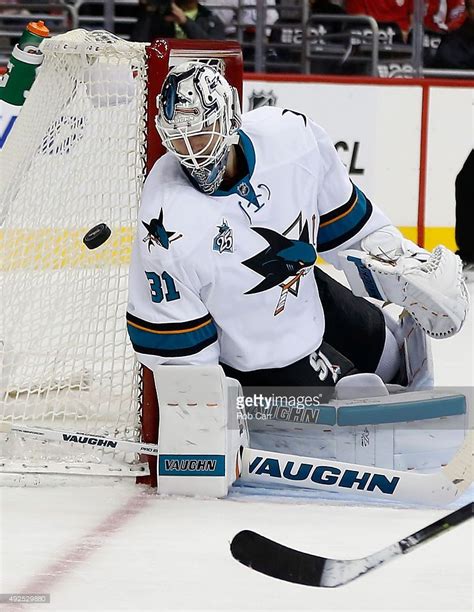 Goalie Martin Jones of the San Jose Sharks deflects a shot in the ...