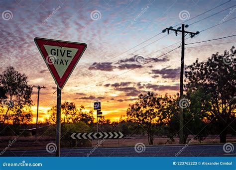 Give Way Australian Road Sign at Sunset Stock Image - Image of clouds ...