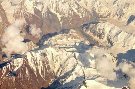 Aerial View Of Tian Shan Mountain Range by Hhakim