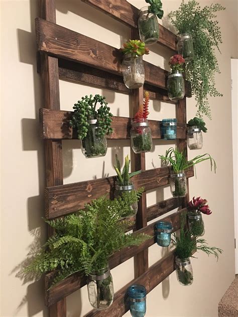 Wood Pallet Mason Jar Hanging Garden - Etsy | Garden wall decor, Pallet garden walls, Hanging garden