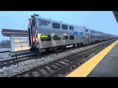 A Metra SD70MACH locomotive visits Western Avenue station & Amtrak’s Empire Builder Flies By ...