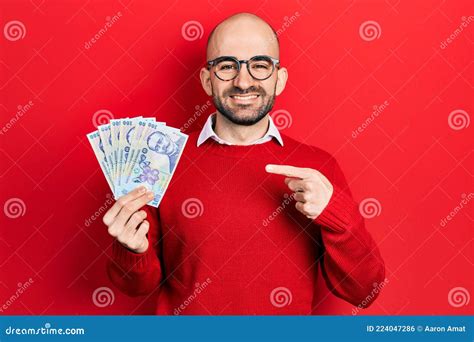 Young Bald Man Holding 100 Romanian Leu Banknotes Smiling Happy ...