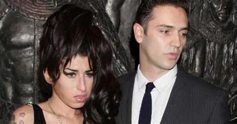 Amy Winehouse and Reg Traviss in New Year Split - Mirror Online