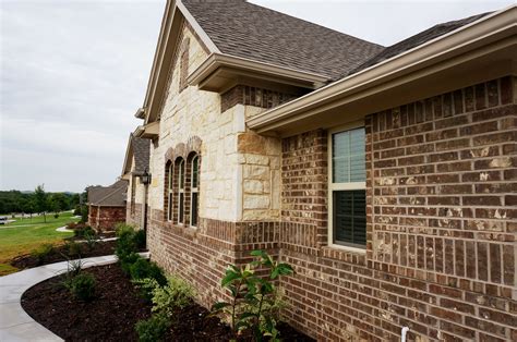 brick and stone exterior #mcbeehomes | Brick exterior house, Exterior ...