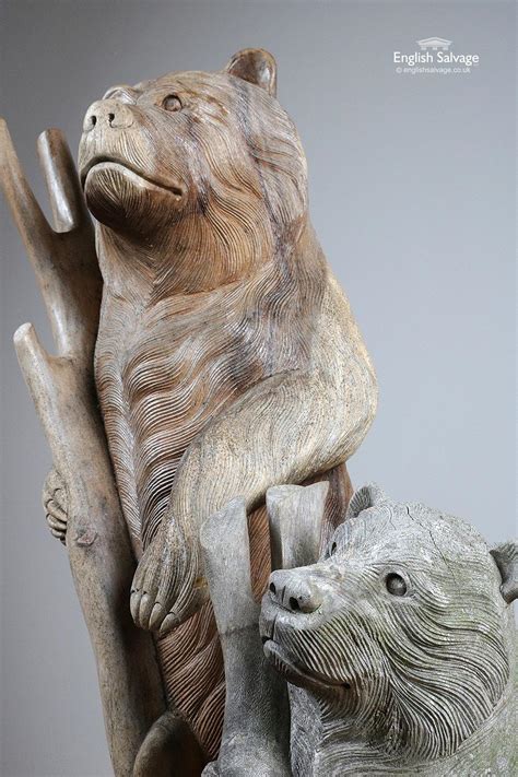 Charming carved hardwood bear statues