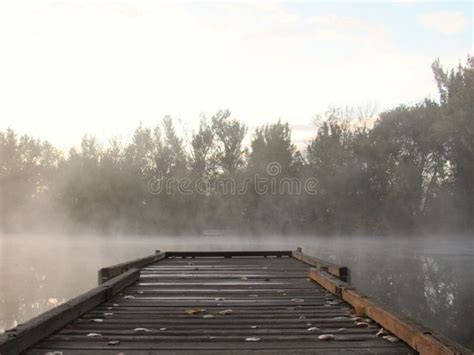 Dock on sunrise lake stock image. Image of dock, sunrise - 78353393