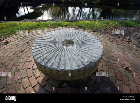 An old stone grist mill wheel outside the Brandywine River Museum Stock Photo, Royalty Free ...